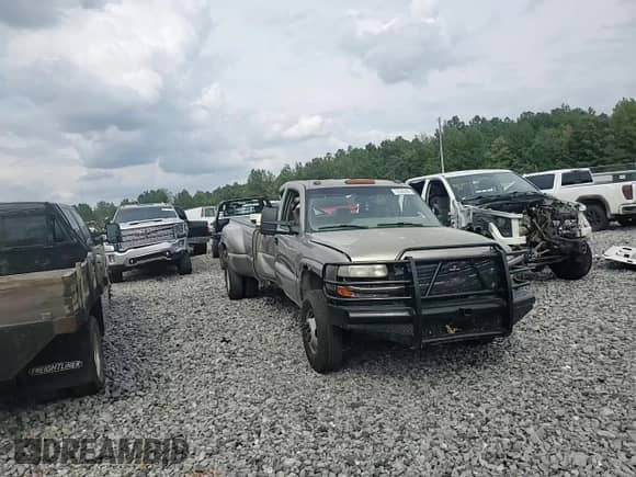 2001 Chevrolet Silverado 3500 LS с VIN 1GCJC33121F182199, выставлен на аукционе Copart как лот 72530404 с пробегом 252 199 миль миль и Списание • Salvage title. История ставок и продаж доступна на DreamBid. Изображение 12.