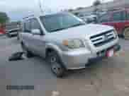 2007 Honda Pilot EX with VIN 5FNYF28447B011373, listed as a IAAI auction lot 43296314 with 218,827 mi miles and . Bid and sale history available at DreamBid. Image 1.