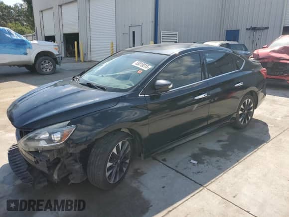 2017 Nissan Sentra SR с VIN 3N1AB7AP2HY239489, выставлен на аукционе Copart как лот 83818015 с пробегом 137 813 миль миль и Списание • Salvage title. История ставок и продаж доступна на DreamBid. Изображение 1.