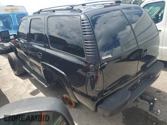 2002 Chevrolet Tahoe LT с VIN 1GNEC13Z82R280284, выставлен на аукционе Copart как лот 70158245 с пробегом 192 291 миль миль и Списание • Salvage title. История ставок и продаж доступна на DreamBid. Изображение 2.