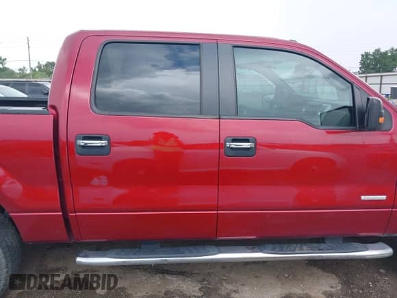 2013 Ford F-150 Lariat with VIN 1FTFW1ET0DKG07088, listed as a IAAI auction lot 42671190 with 202,968 mi miles and . Bid and sale history available at DreamBid. Image 13.