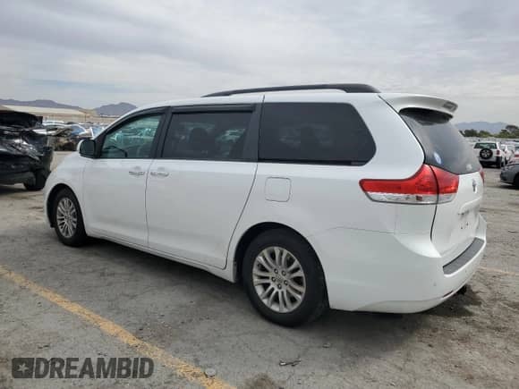 2013 Toyota Sienna XLE AAS с VIN 5TDYK3DC6DS356524, выставлен на аукционе Copart как лот 81346735 с пробегом 119 237 миль миль и Списание • Salvage title. История ставок и продаж доступна на DreamBid. Изображение 2.