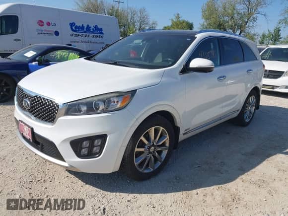 2016 Kia Sorento SXL z VIN 5XYPKDA53GG086158, wystawiony jako IAAI lot #43352887 z przebiegiem 168 301 mil mil oraz . Historia ofert i sprzedaży dostępna na DreamBid. Obrazek 2.