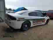 2023 Dodge Charger Police z VIN 2C3CDXAT9PH532442, wystawiony jako Copart lot #61602435 z przebiegiem Nie podano mil oraz Nie do naprawy • Non repairable. Historia ofert i sprzedaży dostępna na DreamBid. Obrazek 3.