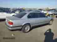 1999 BMW 7 Series 740iL with VIN WBAGH833XXDP05142, listed as a Copart auction lot 74104394 with Not provided miles and Salvage title. Bid and sale history available at DreamBid. Image 3.