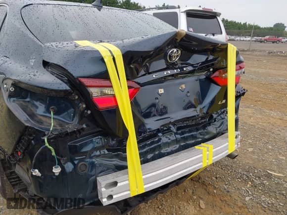 2021 Toyota Camry LE with VIN 4T1C11AK8MU548158, listed as a IAAI auction lot 43333222 with 34,824 mi miles and . Bid and sale history available at DreamBid. Image 6.