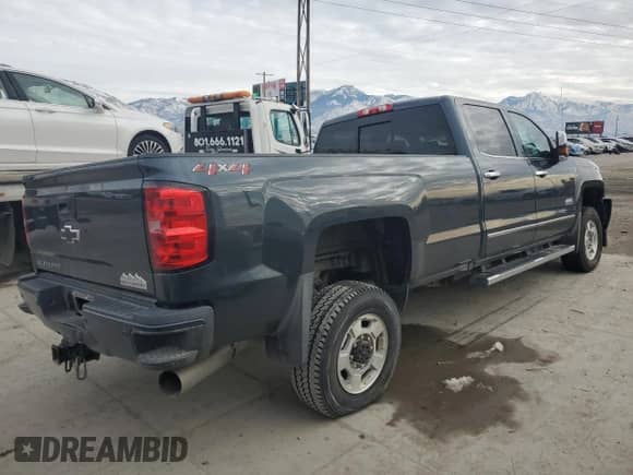 2018 Chevrolet Silverado 3500HD High Country с VIN 1GC4K1EY7JF108484, выставлен на аукционе Copart как лот 87854835 с пробегом 88 518 миль миль и Списание • Salvage title. История ставок и продаж доступна на DreamBid. Изображение 3.