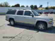 2003 Chevrolet Suburban Z71 with VIN 3GNFK16TX3G178890, listed as a Copart auction lot 62189535 with 158,090 mi miles and Salvage title. Bid and sale history available at DreamBid. Image 4.