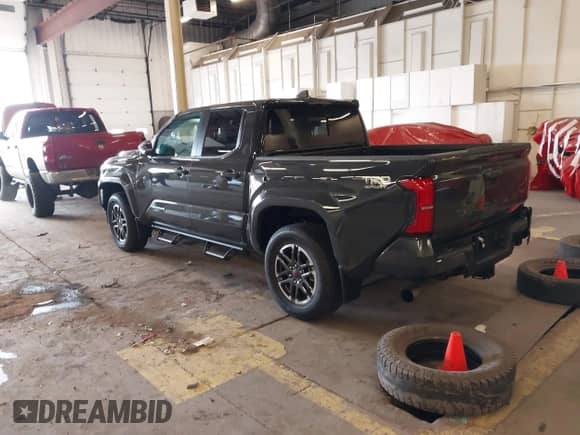 2024 Toyota Tacoma SR5 with VIN 3TMLB5JN9RM067351, listed as a IAAI auction lot 41529043 with 3,054 mi miles and . Bid and sale history available at DreamBid. Image 3.