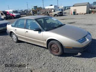 1995 Saturn SL with VIN 1G8ZG528XSZ264242, listed as a IAAI auction lot 42883470 with 141,027 mi miles and . Bid and sale history available at DreamBid. Image 1.