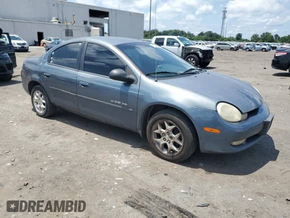 2001 Dodge Neon SE with VIN 1B3AS46C71D109140, listed as a Copart auction lot 64239665 with 276,579 mi miles and Clean title. Bid and sale history available at DreamBid. Image 4.