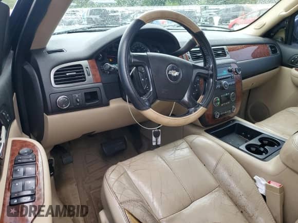 2007 Chevrolet Tahoe LT with VIN 1GNFC13J47R233291, listed as a Copart auction lot 67829455 with 310,968 mi miles and Salvage title. Bid and sale history available at DreamBid. Image 8.