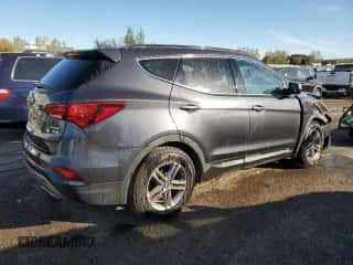 2017 Hyundai Santa Fe 2.4L z VIN 5XYZUDLB5HG449387, wystawiony jako Copart lot #80966025 z przebiegiem 187 312 mil mil oraz Szkoda całkowita • Salvage title. Historia ofert i sprzedaży dostępna na DreamBid. Obrazek 3.