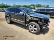 2012 Jeep Grand Cherokee Overland with VIN 1C4RJFCT9CC346497, listed as a Copart auction lot 63004635 with 142,623 mi miles and Salvage title. Bid and sale history available at DreamBid. Image 4.