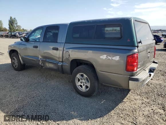2006 Dodge Dakota SLT z VIN 1D7HW48N26S537187, wystawiony jako Copart lot #81302215 z przebiegiem 164 101 mil mil oraz Szkoda całkowita • Salvage title. Historia ofert i sprzedaży dostępna na DreamBid. Obrazek 2.