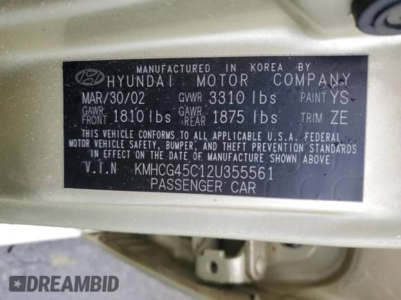 2002 Hyundai Accent GL z VIN KMHCG45C12U355561, wystawiony jako Copart lot #54546945 z przebiegiem 22 893 mil mil oraz Szkoda całkowita • Salvage title. Historia ofert i sprzedaży dostępna na DreamBid. Obrazek 12.