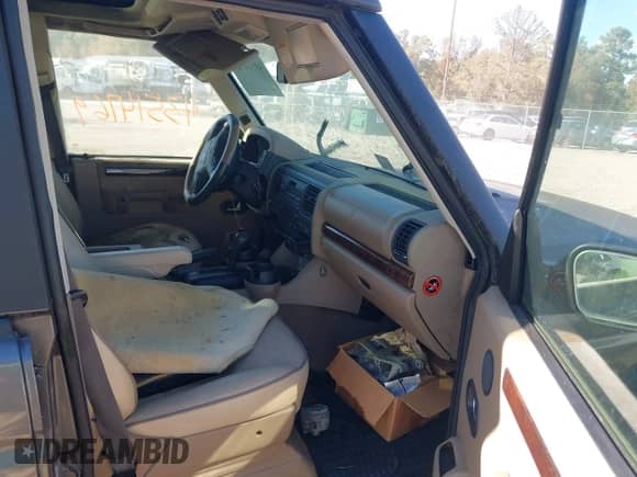 2002 Land Rover Discovery Cloth with VIN SALTY124X2A770417, listed as a IAAI auction lot 43514769 with 165,445 mi miles and . Bid and sale history available at DreamBid. Image 5.