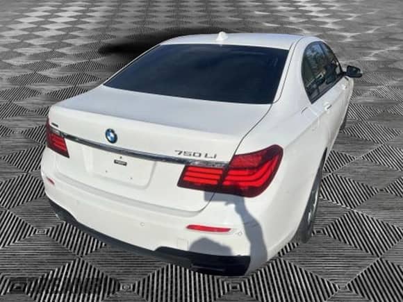 2015 BMW 7 Series 750Li xDrive with VIN WBAYF8C59FD654632, listed as a Copart auction lot 80374015 with 100,232 mi miles and Clean title. Bid and sale history available at DreamBid. Image 3.