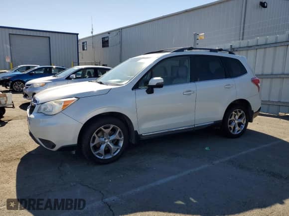 2015 Subaru Forester Touring with VIN JF2SJAUC5FH401331, listed as a Copart auction lot 82628925 with 134,059 mi miles and Clean title. Bid and sale history available at DreamBid. Image 1.