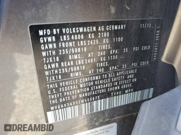 2014 Volkswagen Tiguan SEL z VIN WVGAV3AX0EW555873, wystawiony jako Copart lot #55695955 z przebiegiem 69 984 mil mil oraz Szkoda całkowita • Salvage title. Historia ofert i sprzedaży dostępna na DreamBid. Obrazek 13.