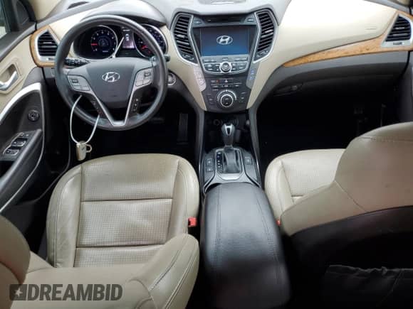 2015 Hyundai Santa Fe с VIN 5XYZW4LA0FG245031, выставлен на аукционе Copart как лот 69493305 с пробегом 141 389 миль миль и Списание • Salvage title. История ставок и продаж доступна на DreamBid. Изображение 8.