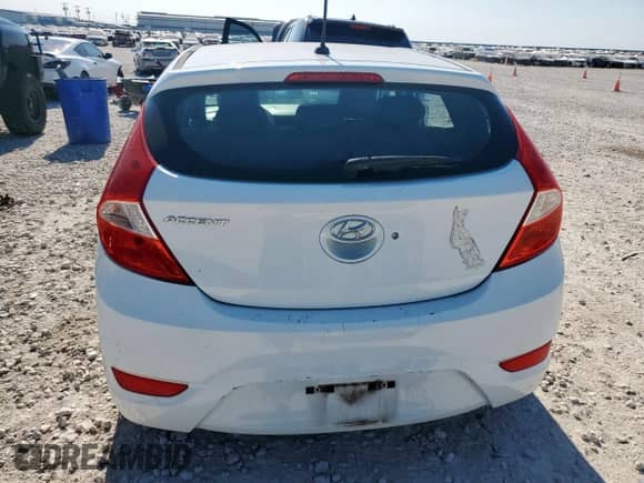 2015 Hyundai Accent GS z VIN KMHCT5AEXFU202496, wystawiony jako Copart lot #80401945 z przebiegiem 96 144 mil mil oraz Szkoda całkowita • Salvage title. Historia ofert i sprzedaży dostępna na DreamBid. Obrazek 6.