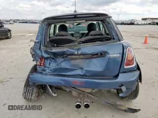 2010 MINI Hardtop S with VIN WMWMF7C51ATZ69061, listed as a Copart auction lot 60837465 with 102,506 mi miles and Salvage title. Bid and sale history available at DreamBid. Image 6.