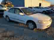 1999 Honda Accord LX with VIN 1HGCG1644XA068753, listed as a Copart auction lot 87135784 with 74,386 mi miles and Clean title. Bid and sale history available at DreamBid. Image 4.