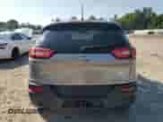 2016 Jeep Cherokee Latitude with VIN 1C4PJMCB2GW100138, listed as a Copart auction lot 64548445 with 211,628 mi miles and Salvage title. Bid and sale history available at DreamBid. Image 6.