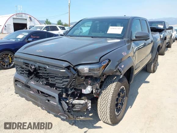 2024 Toyota Tacoma TRD Off Road with VIN 3TMLB5JN7RM069938, listed as a IAAI auction lot 43056789 with 6,837 mi miles and . Bid and sale history available at DreamBid. Image 6.
