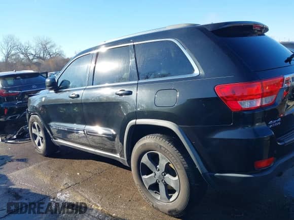 2011 Jeep Grand Cherokee 70th Anniversary z VIN 1J4RR4GT8BC504618, wystawiony jako IAAI lot #40993960 z przebiegiem 188 098 mil mil oraz . Historia ofert i sprzedaży dostępna na DreamBid. Obrazek 14.