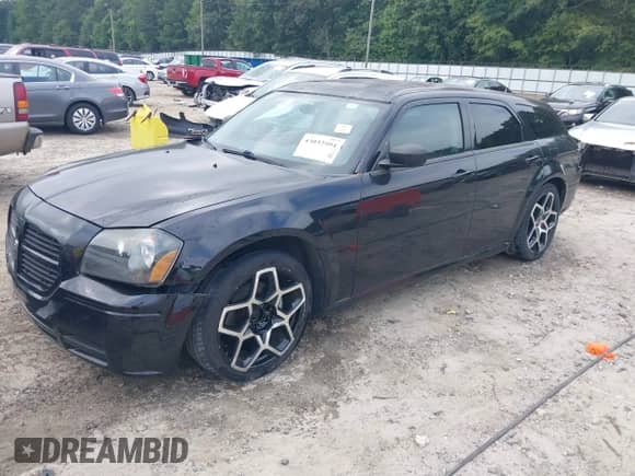 2005 Dodge Magnum SE with VIN 2D4FV48T75H617094, listed as a IAAI auction lot 43032594 with 165,780 mi miles and . Bid and sale history available at DreamBid. Image 18.