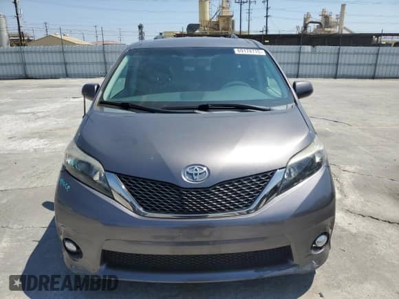 2014 Toyota Sienna SE with VIN 5TDXK3DCXES490627, listed as a Copart auction lot 69174715 with 149,966 mi miles and Salvage title. Bid and sale history available at DreamBid. Image 5.
