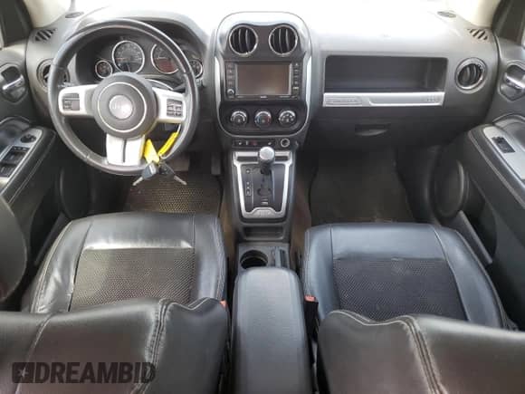2015 Jeep Compass Latitude with VIN 1C4NJCEB9FD296054, listed as a Copart auction lot 65058744 with 122,604 mi miles and Salvage title. Bid and sale history available at DreamBid. Image 8.