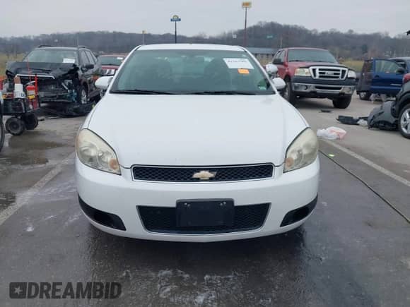 2013 Chevrolet Impala Police with VIN 2G1WD5E35D1222227, listed as a IAAI auction lot 41163786 with 176,742 mi miles and . Bid and sale history available at DreamBid. Image 12.