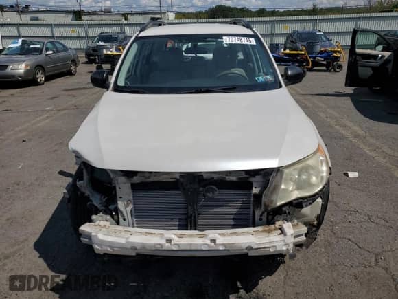 2013 Subaru Forester X z VIN JF2SHABC0DG424937, wystawiony jako Copart lot #70748745 z przebiegiem 149 471 mil mil oraz Szkoda całkowita • Salvage title. Historia ofert i sprzedaży dostępna na DreamBid. Obrazek 5.