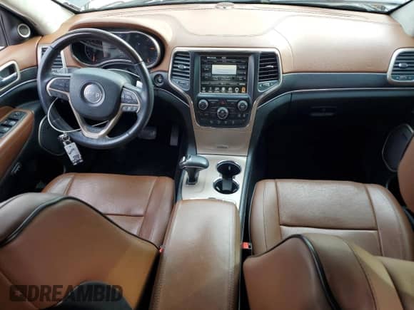 2015 Jeep Grand Cherokee Summit with VIN 1C4RJFJT7FC674427, listed as a Copart auction lot 84535555 with 93,576 mi miles and Salvage title. Bid and sale history available at DreamBid. Image 8.