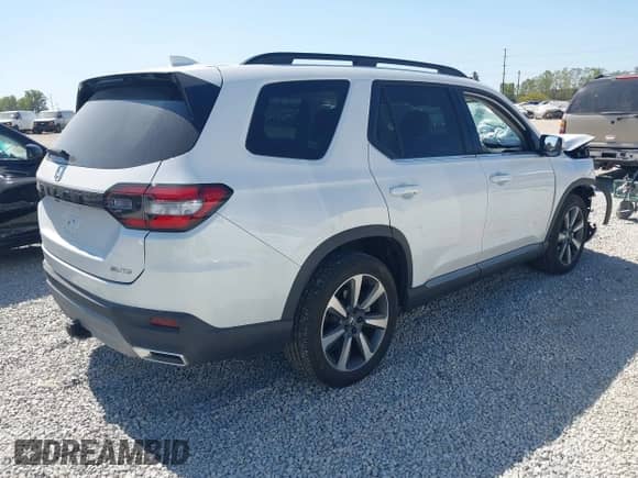 2024 Honda Pilot Elite with VIN 5FNYG1H85RB014506, listed as a IAAI auction lot 43202074 with 17,609 mi miles and . Bid and sale history available at DreamBid. Image 4.