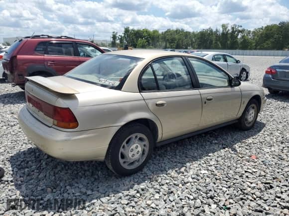 1997 Saturn SL с VIN 1G8ZK5278VZ247658, выставлен на аукционе Copart как лот 56890845 с пробегом 51 996 миль миль и Чистый • Clean title. История ставок и продаж доступна на DreamBid. Изображение 3.