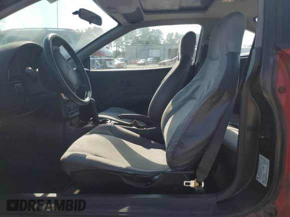 1995 Saturn SC with VIN 1G8ZE1285SZ141155, listed as a Copart auction lot 65757374 with 150,973 mi miles and Salvage title. Bid and sale history available at DreamBid. Image 7.