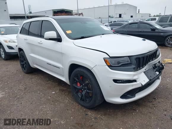 2016 Jeep Grand Cherokee SRT with VIN 1C4RJFDJ0GC456325, listed as a IAAI auction lot 41425211 with 159,746 mi miles and . Bid and sale history available at DreamBid. Image 1.