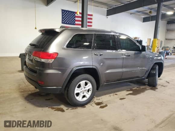 2017 Jeep Grand Cherokee Laredo with VIN 1C4RJFAG0HC740595, listed as a Copart auction lot 82113385 with 133,586 mi miles and Clean title. Bid and sale history available at DreamBid. Image 3.