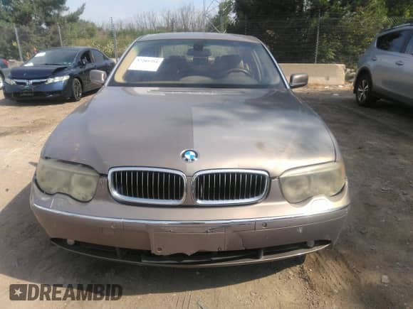 2004 BMW 7 Series 745Li with VIN WBAGN63514DS54659, listed as a IAAI auction lot 37205351 with 118,477 mi miles and . Bid and sale history available at DreamBid. Image 6.