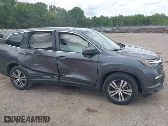 2017 Honda Pilot EX-L z VIN 5FNYF5H55HB038934, wystawiony jako IAAI lot #42892558 z przebiegiem 80 984 mil mil oraz . Historia ofert i sprzedaży dostępna na DreamBid. Obrazek 13.