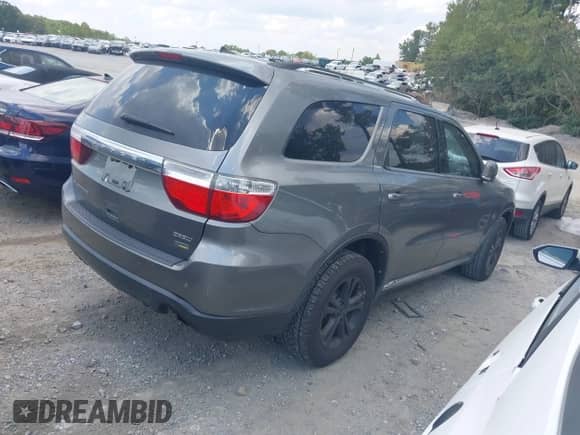 2011 Dodge Durango Crew with VIN 1D4RD4GG3BC740328, listed as a IAAI auction lot 43129169 with 167,553 mi miles and . Bid and sale history available at DreamBid. Image 4.
