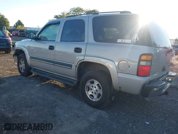 2005 Chevrolet Tahoe LS with VIN 1GNEK13T65J195414, listed as a IAAI auction lot 43409539 with 299,458 mi miles and . Bid and sale history available at DreamBid. Image 3.