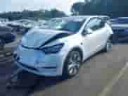 2022 Tesla Model Y Long Range z VIN 7SAYGDEEXNF418006, wystawiony jako IAAI lot #43267037 z przebiegiem 36 028 mil mil oraz . Historia ofert i sprzedaży dostępna na DreamBid. Obrazek 17.