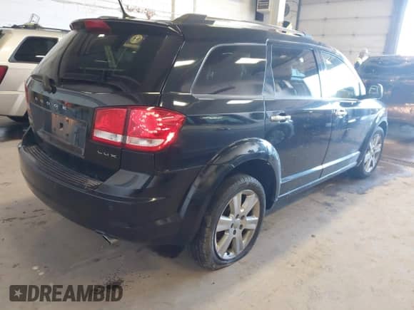 2011 Dodge Journey LUX z VIN 3D4PH9FG4BT511347, wystawiony jako IAAI lot #41927902 z przebiegiem 145 729 mil mil oraz . Historia ofert i sprzedaży dostępna na DreamBid. Obrazek 4.
