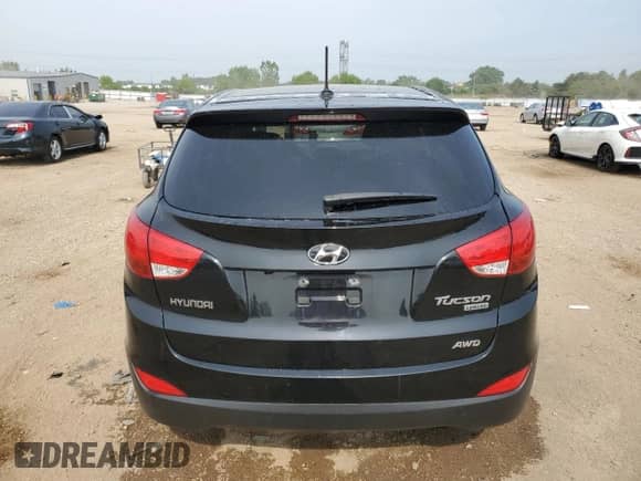 2012 Hyundai Tucson Limited с VIN KM8JUCAC2CU405336, выставлен на аукционе Copart как лот 60644755 с пробегом 83 563 миль миль и Списание • Salvage title. История ставок и продаж доступна на DreamBid. Изображение 6.