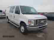 2014 Ford Econoline Cargo Commercial with VIN 1FTNE2EW2EDA19200, listed as a IAAI auction lot 43432200 with 143,691 mi miles and . Bid and sale history available at DreamBid. Image 1.